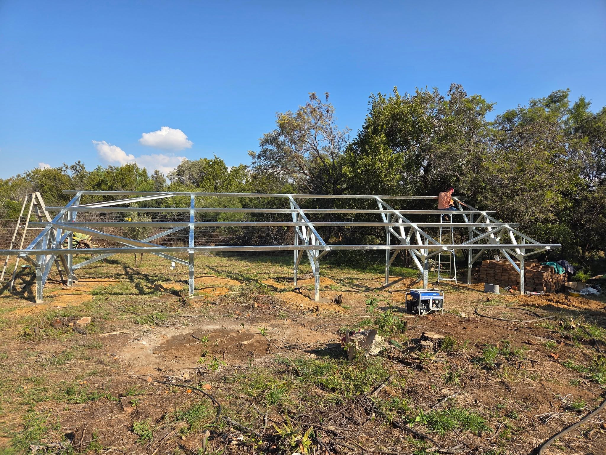 Custom steel ground-mount solar frame